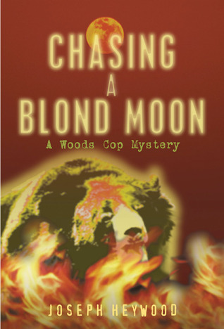 Chasing A Blond Moon: A Woods Cop Mystery (2003) by Joseph Heywood